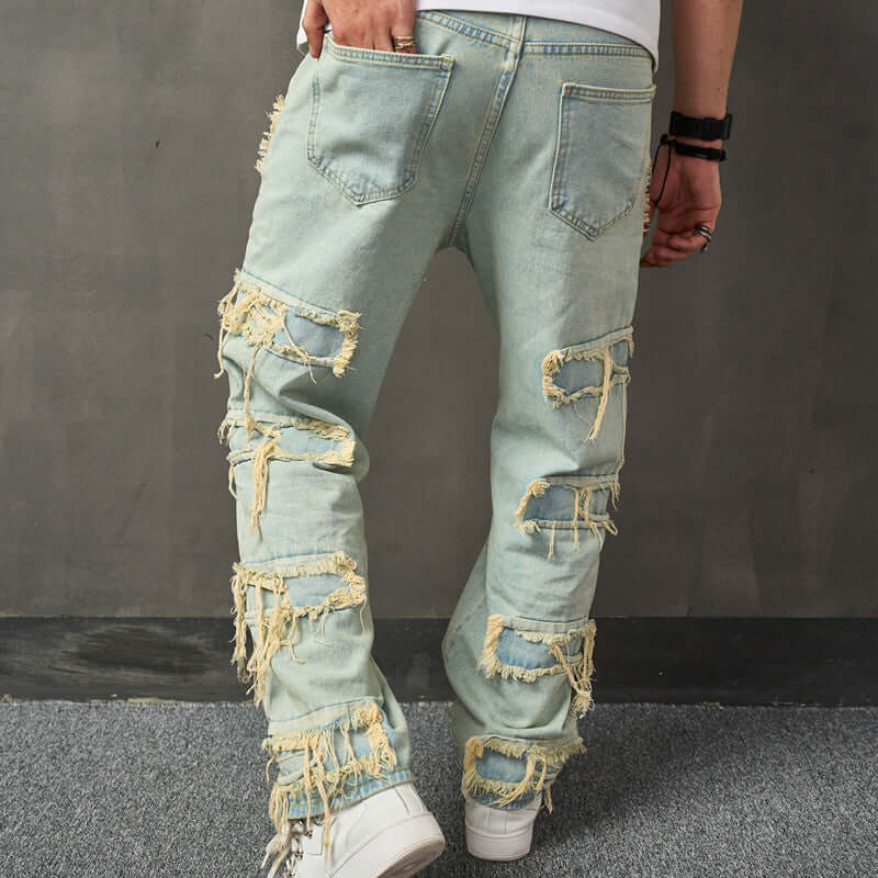 Jeans American Retro Wide Leg Jeans For Men con diseño desgastado y detalles rasgados, vista trasera.