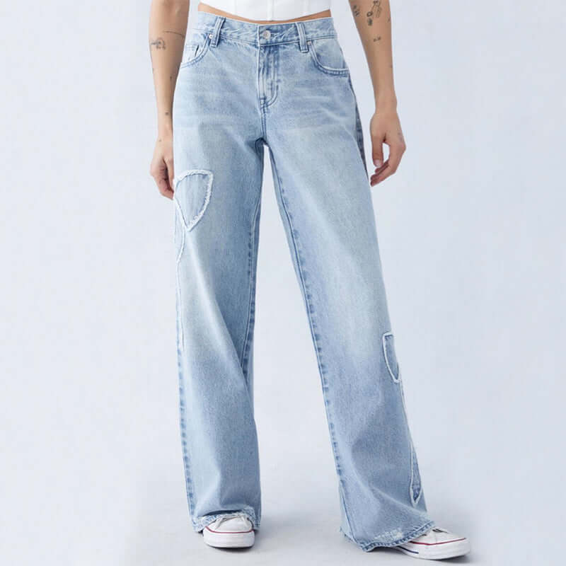 pantalones vaqueros bordados con mariposa, mezcla de mezclilla, estilo casual y moderno.