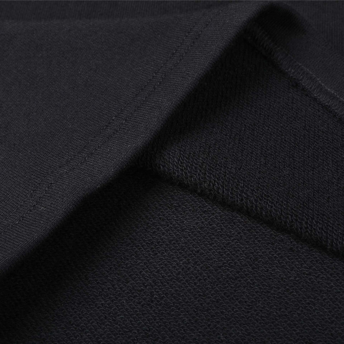Calcas cortas de algodón para hombres en color negro, con ajuste holgado y cordón de cierre.