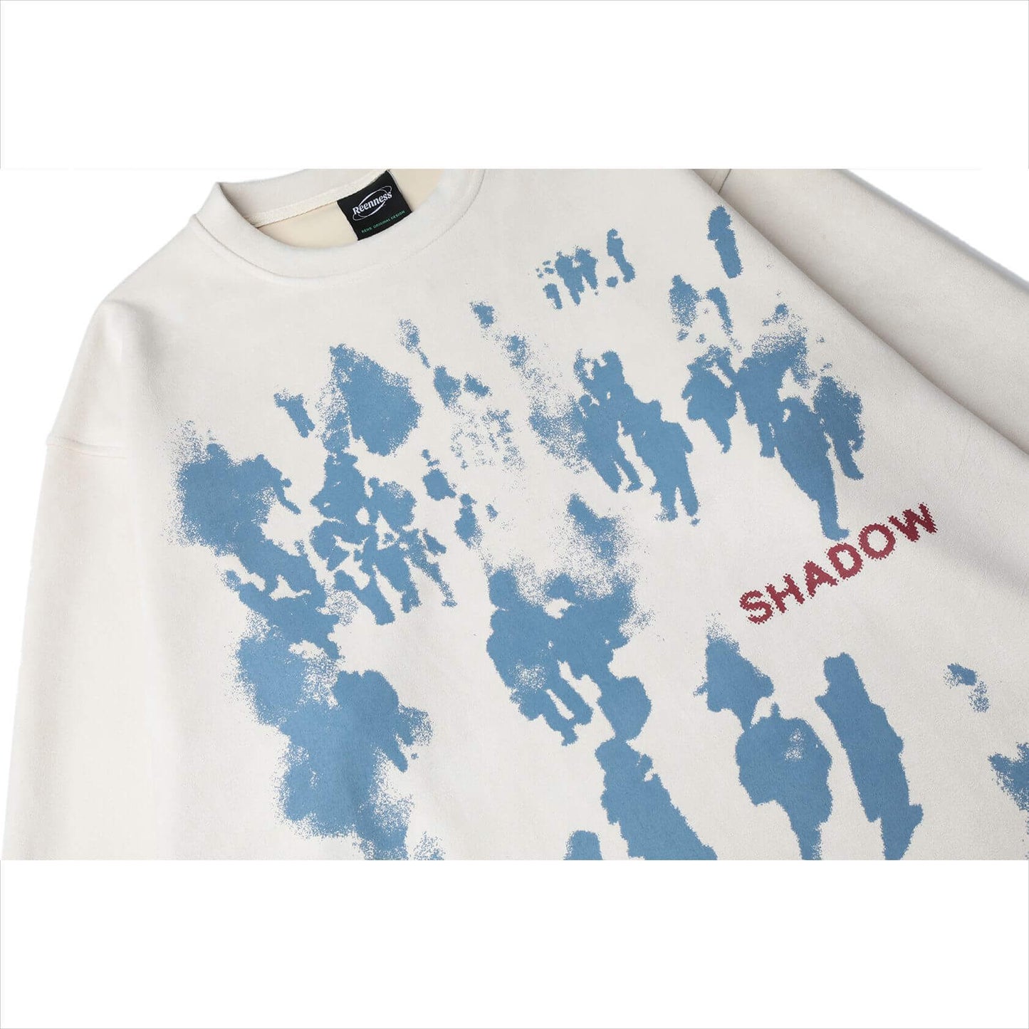 abstract heavyweight antler leather long sleeve en color blanco con diseño azul y texto 'SHADOW' en estilo moderno.