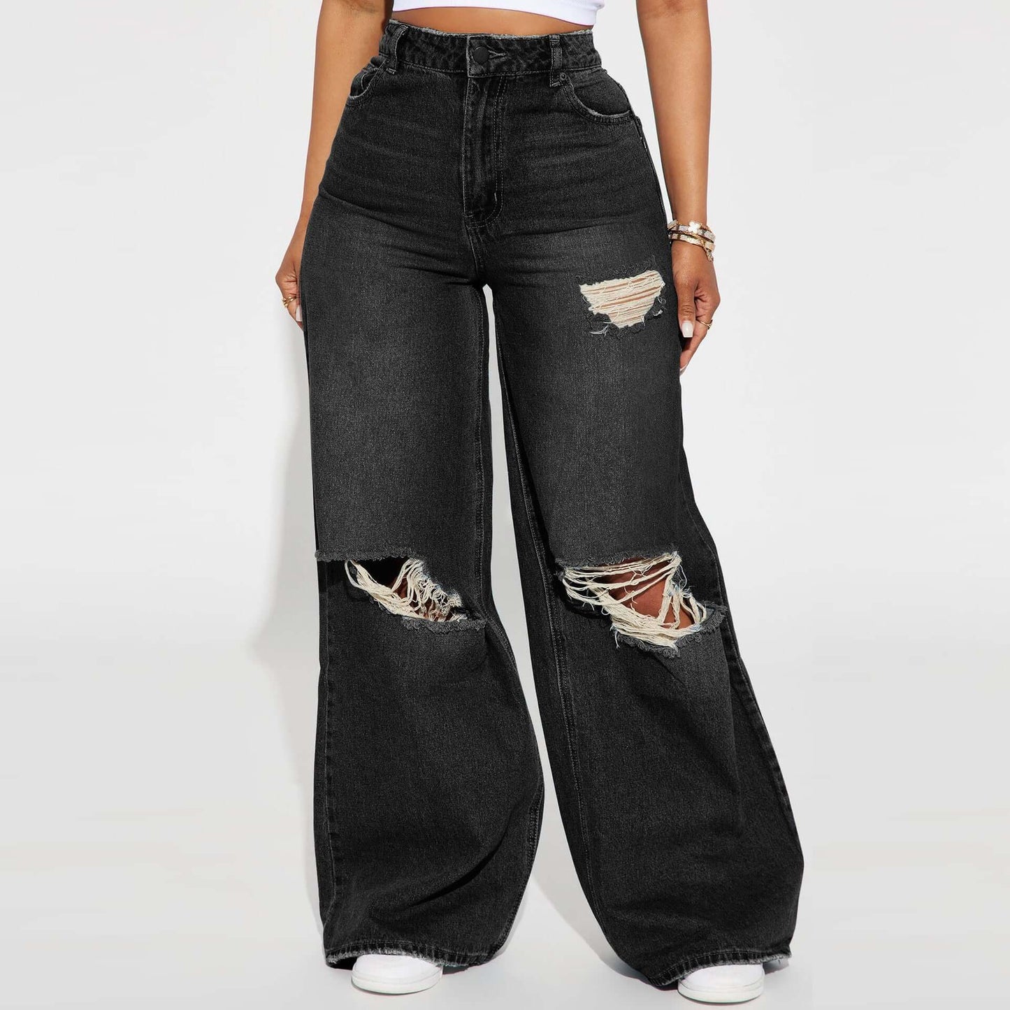 jeans de pierna ancha para mujer en color azul oscuro con detalles rasgados